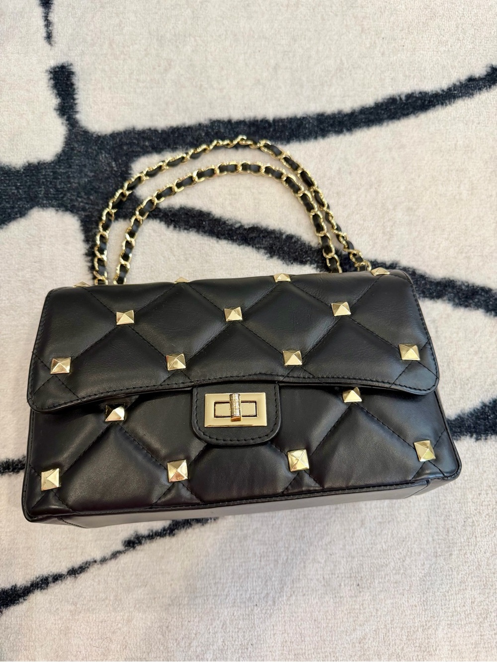 Black Quilted Shoulder Bag with Gold Studs and Chain Strap